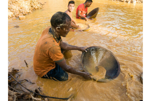 man is panning for gold