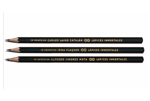 Three pencils with the names of journalists on them