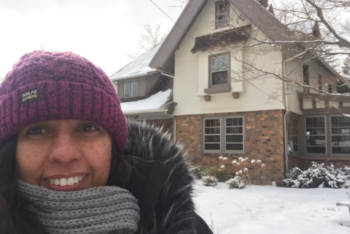 Photo of journalist Marielba Núñez outside house in snow