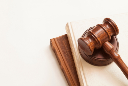 Photo of a gavel and law book