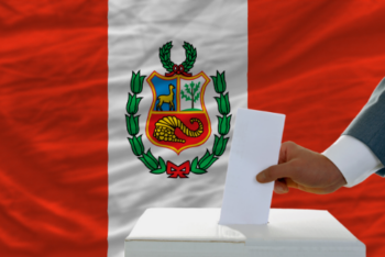 Peruvian flag and a ballot box