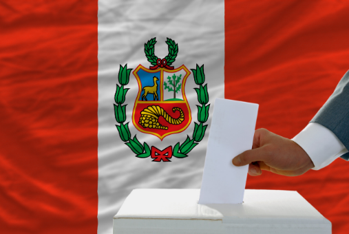 Peruvian flag and a ballot box