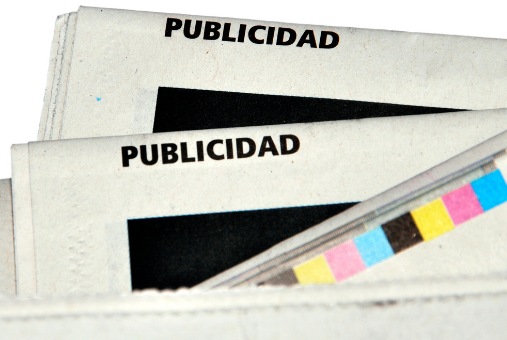 the word "Publicidad" printed on a newspaper
