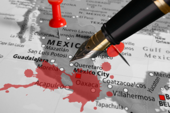 map of Mexico with blood stains and a pen