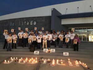 Journalists protest outside the office of the Chihuahua state Attorney General to demand justice in the murder of reporter Miroslava Breach.