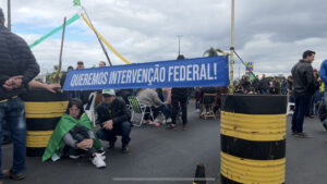 Street protests in Brazil, blue banner calling for federal intervention