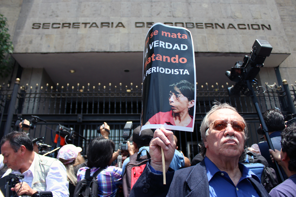Protest in front of Mexico's Ministry of Interior building against violence against journalists.