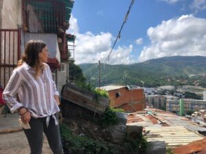a woman on the top of a favela
