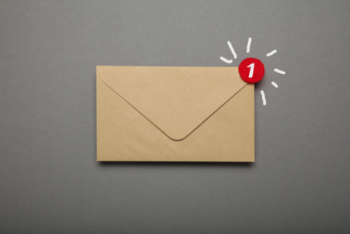 a beige envelope on a gray background