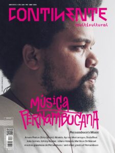 A man with beard on the cover of the Continente magazine