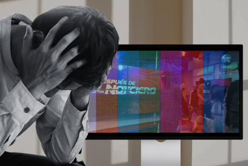 A man holds his head in distress with a TV showing a newscast as a background.