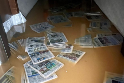 print newspapers in a flooded room