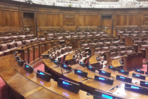 Large chamber of government with empty seats