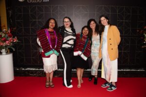 five women in an award ceremony