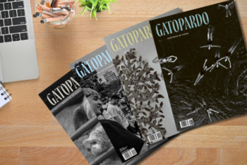 Four issues of Gatopardo magazine laying on a wood table, seen from above. (Photo: Canva and courtesy Gatopardo)