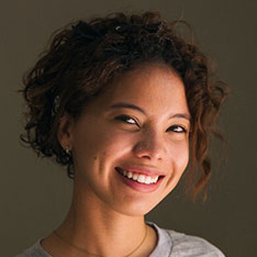 woman smiling to the camera 