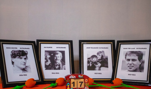 Four frames with photos of Dutch journalists