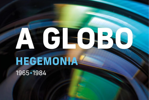 : "Cover of the book 'A Globo: Hegemony 1965-1984,' the first volume of a trilogy about Brazil's TV Globo network by journalist and professor Ernesto Rodrigues. The cover features a close-up of a camera lens with dynamic green and blue lighting effects."