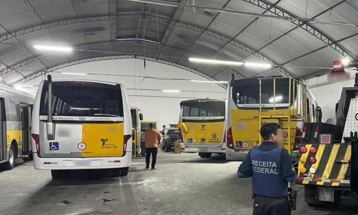 Garage full of buses and police