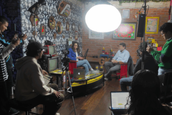 Group of people watching an interview