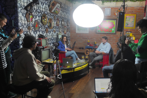 Group of people watching an interview