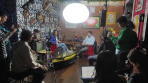 Group of people watching an interview