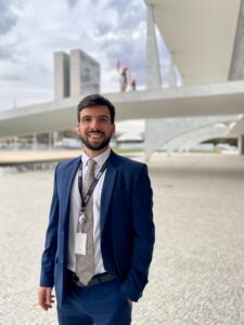 Man poses in front of Presidential Palace in Brazil
