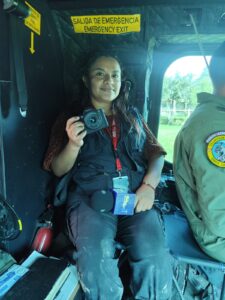 Mexican journalist Kattia Vera a board a military rescue vehicle holding a camera and a microphone during a coverage. (Photo: Courtesy Kattia Vera)