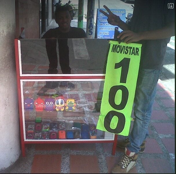 A man selling cellphone airtime on the street