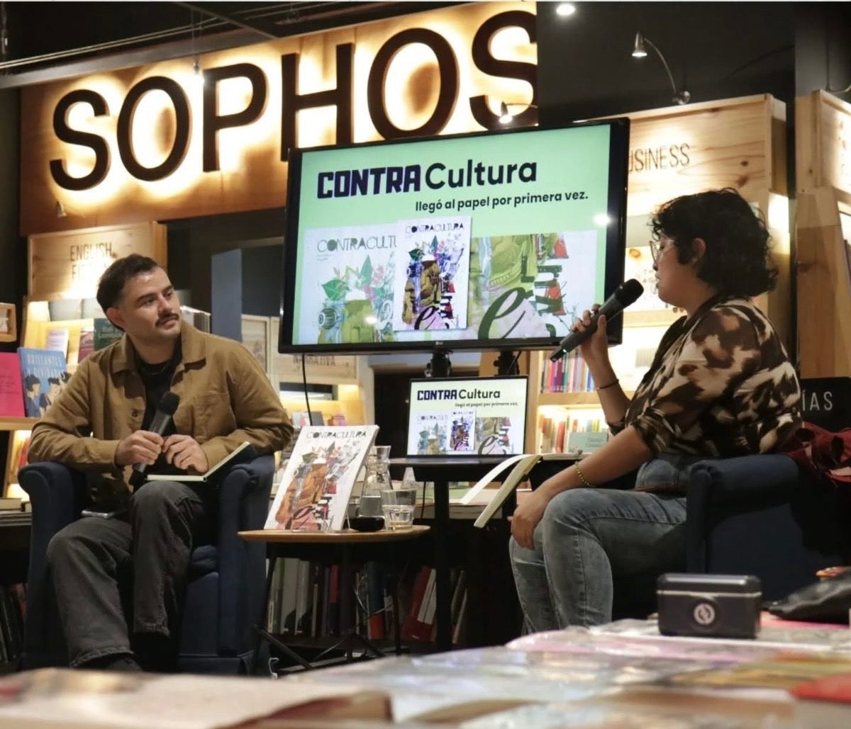 A man and a woman talking in a stage