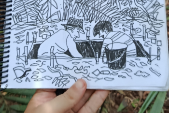 Hand holding a comic book strip