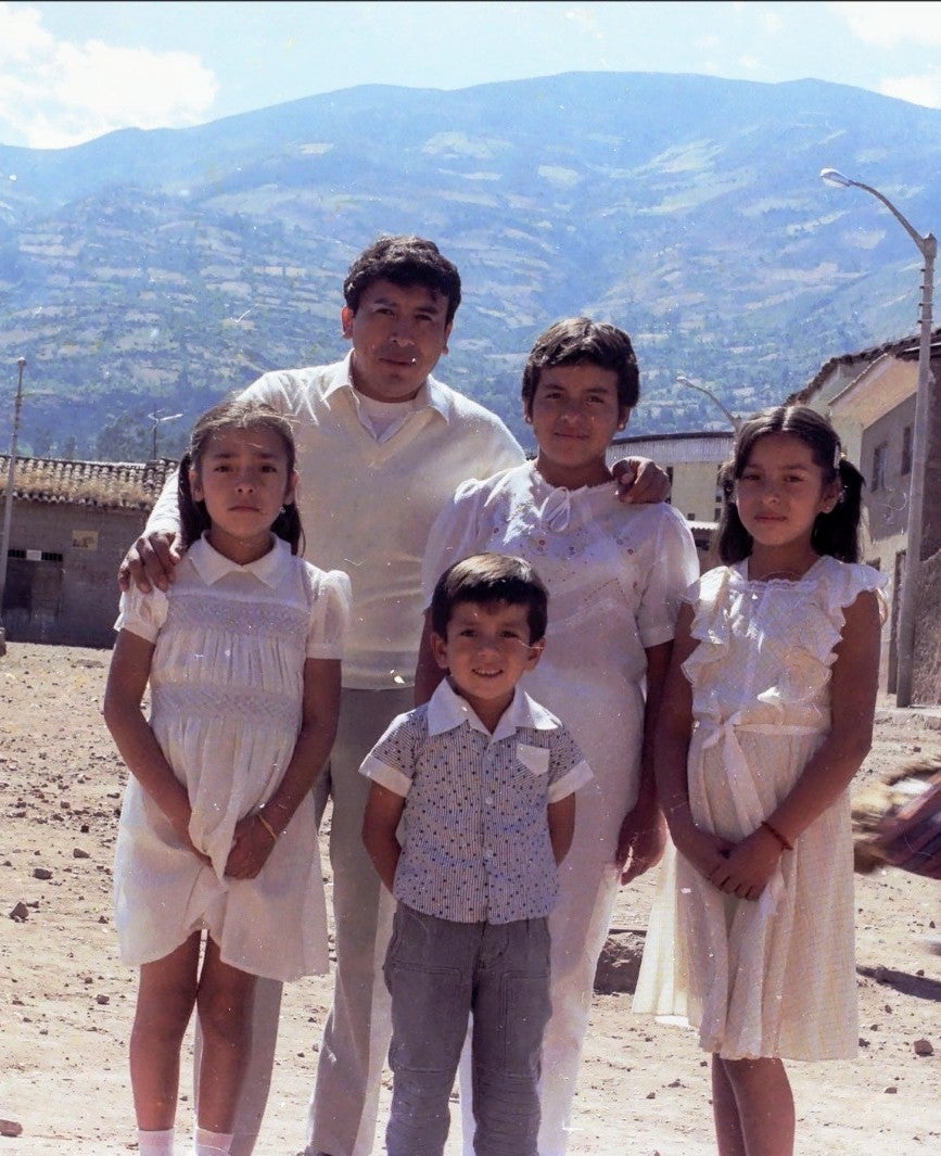 Family portrait of a man with his four children underage
