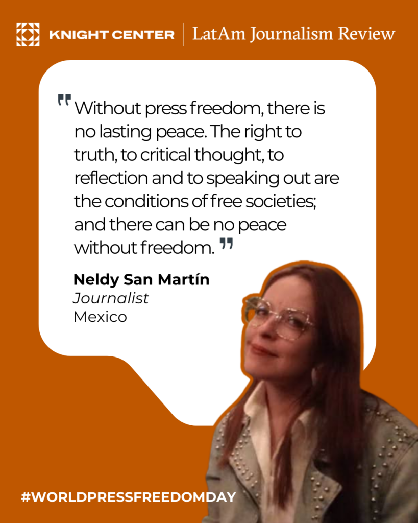 Person in glasses standing in front of quote
