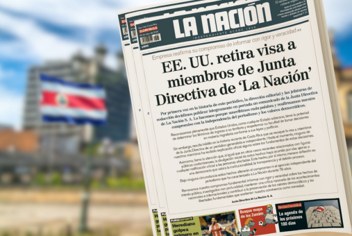 Printed issue of La Nación newspaper over a blurred background of an urban landscape of San José de Costa Rica.